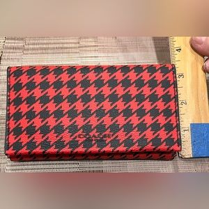 Coach cellphone wallet. Slightly used.No rips/ stain. See details for phone size